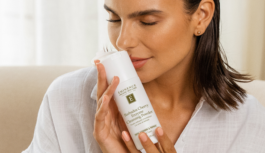 a woman holding the barbados cherry enzyme cleansing powder