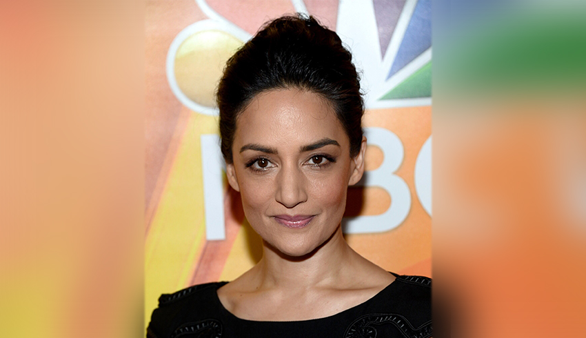 Archie Panjabi Carries This Eminence Organics Favorite In Her Bag