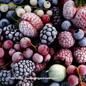 A variety of frozen berries, including strawberries, raspberries, blackberries, and blueberries.