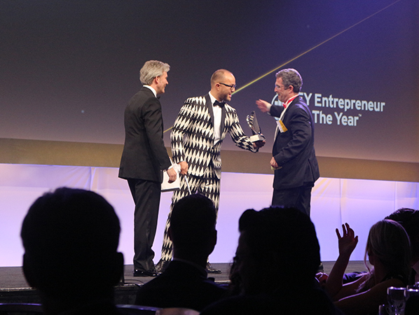 Eminence Organics President Boldijarre Koronczay on stage at the Ernst &amp;amp; Young Entrepreneur of the Year awards ceremony.