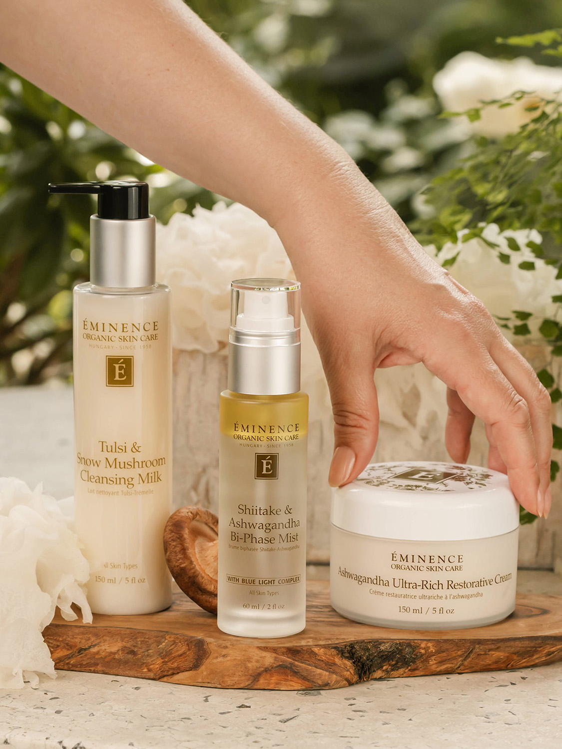 Eminence Organics Ashwagandha Ultra-Rich Restorative Cream  A woman reaching for the Eminence Organics Ashwagandha Ultra-Rich Restorative Cream