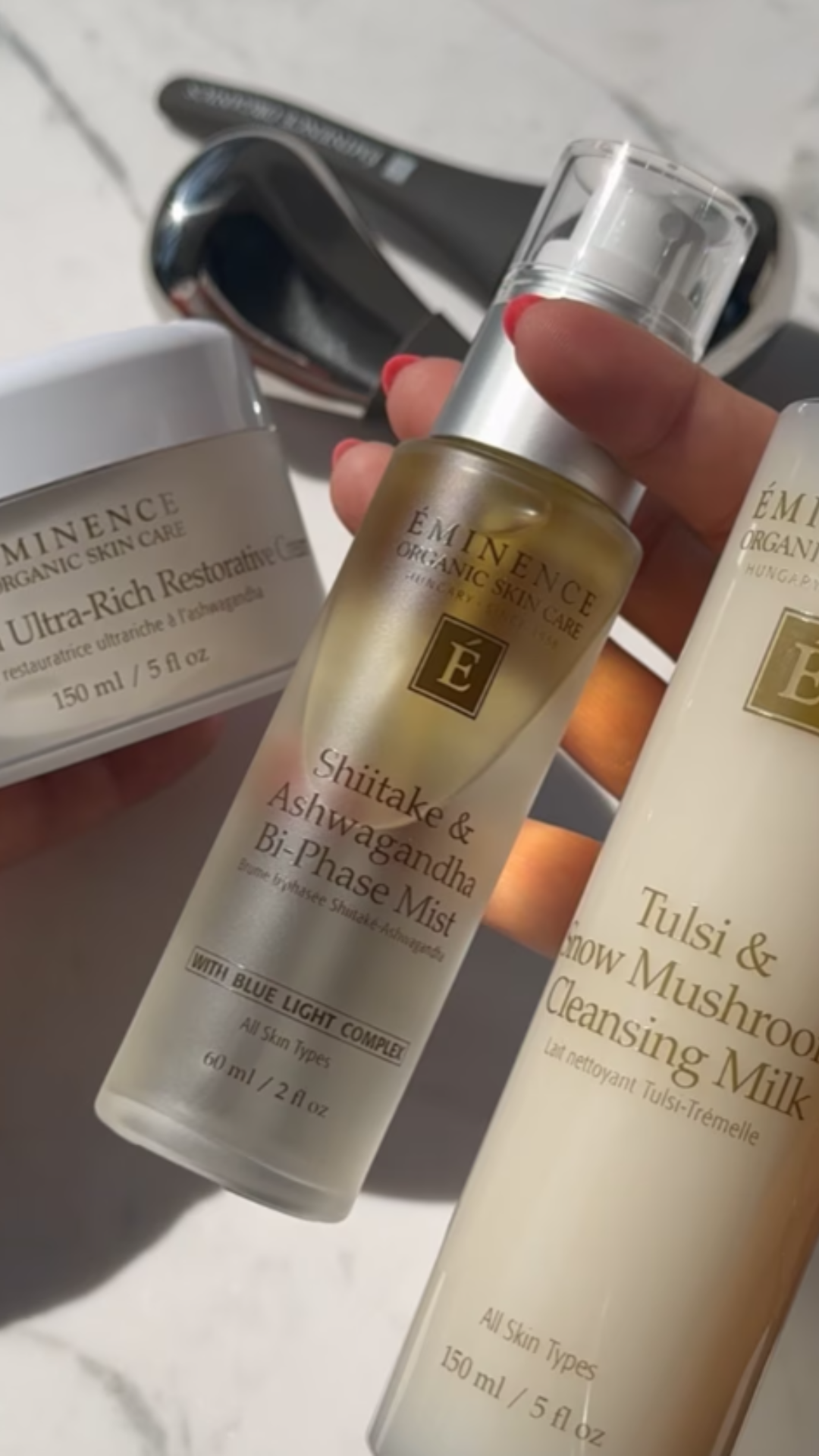 A group of products including the Eminence Organics Shiitake & Ashwagandha Bi-Phase Mist