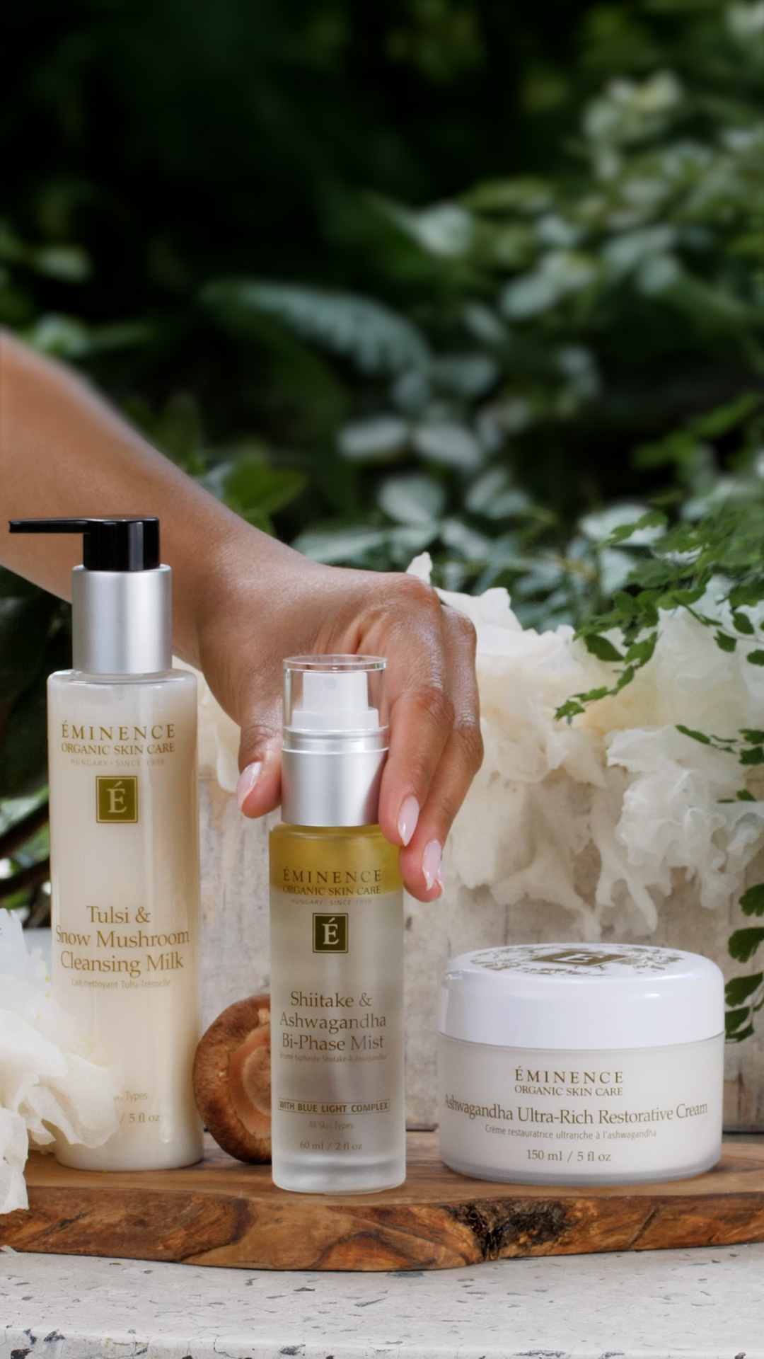 A group of products including the Eminence Organics Shiitake & Ashwagandha Bi-Phase Mist